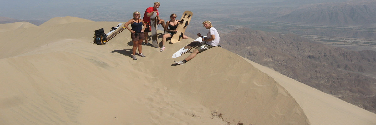 Sandboarding on the White hill in Ica en Nazca
